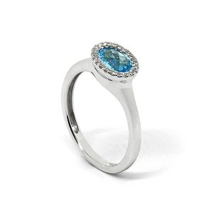 Anillo Topacio Azul Ovalado Rodeado